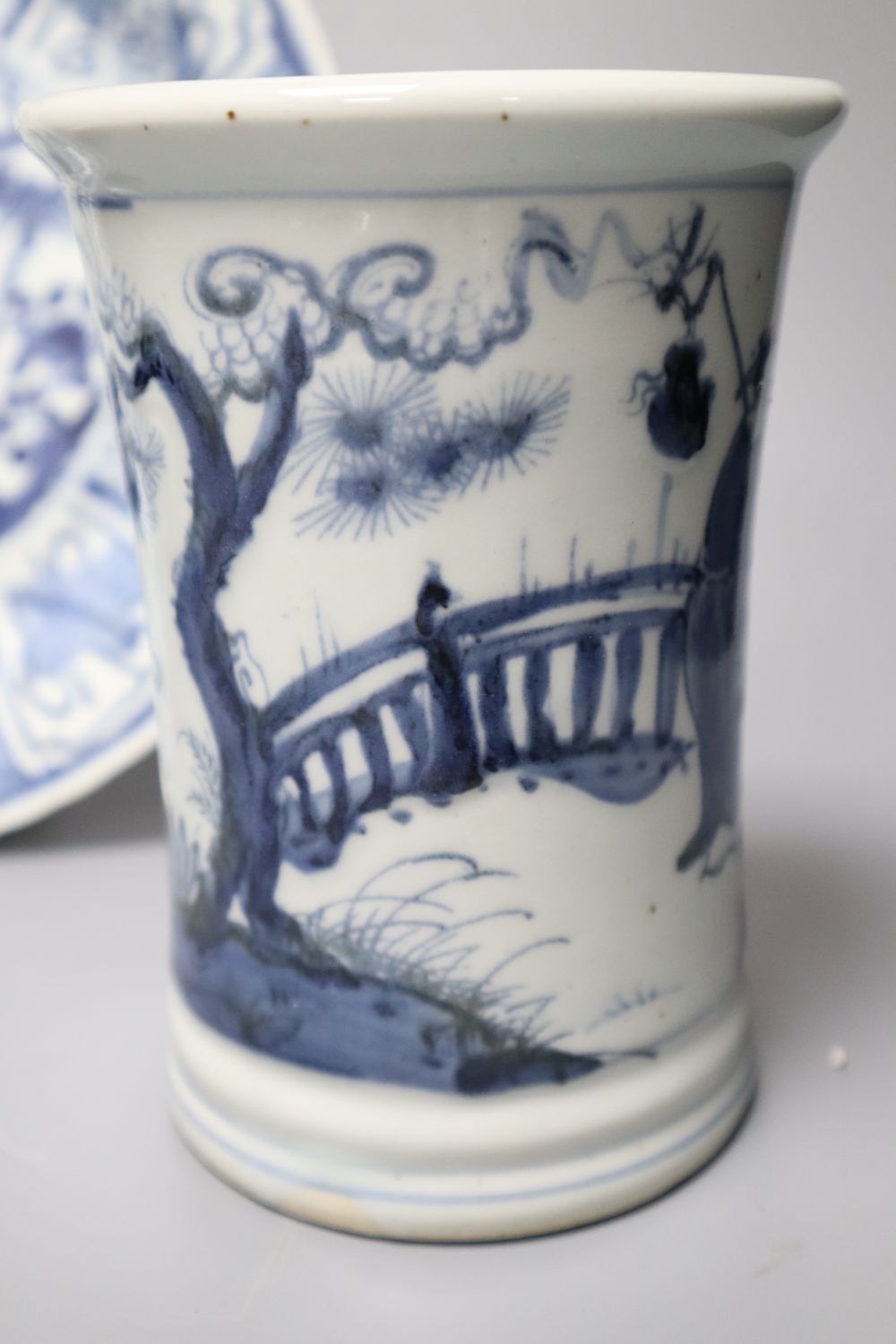 A Chinese blue and white dish, a vase and an English tea bowl